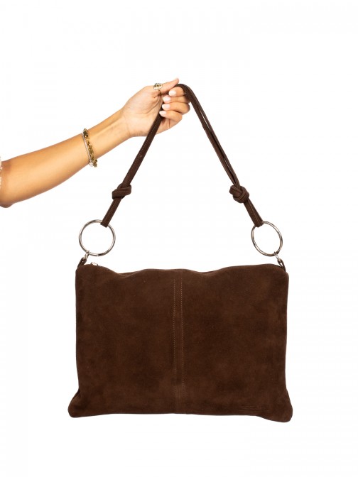 Suede shoulder bag with metal rings. Suede shoulder bag with metal rings.